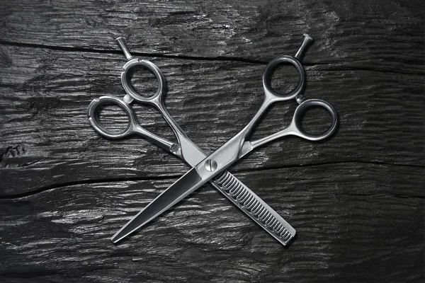 hairdressing different scissors on black