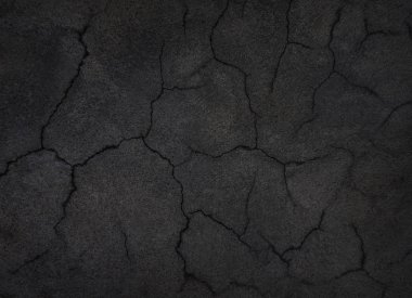 Çatallı eski siyah beton duvar. Sert beton yüzeyi, uzun panorama. Koyu gri kasvetli grunge panoramik arka grup                               