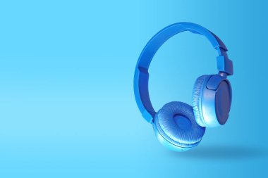 Mavi kulaklıklar mavi arka planda izole edilmiş.                               