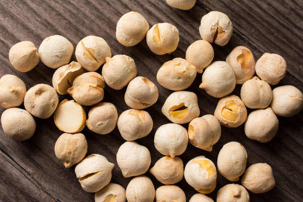 Roasted chickpeas on wooden table