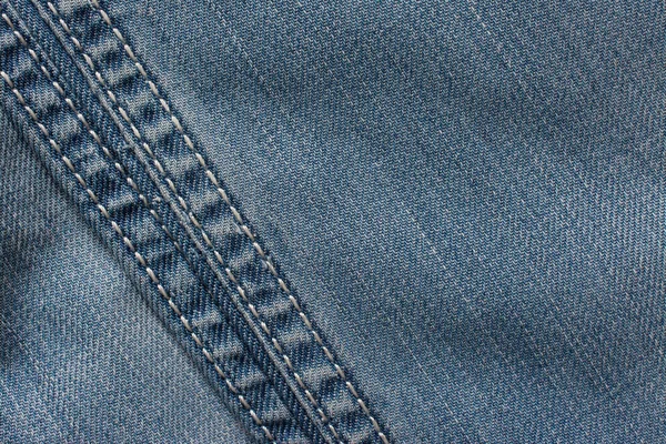 Denim jeans textuur, katoenen stof. Textiel achtergrond — Stockfoto