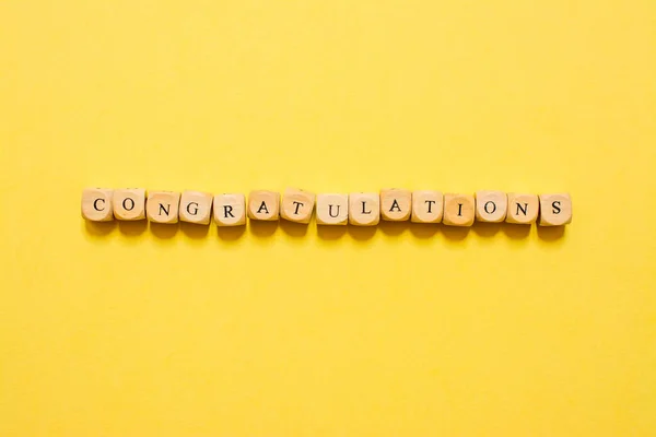 Word Congratulations Text Made Dice Yellow Background — Stock Photo, Image