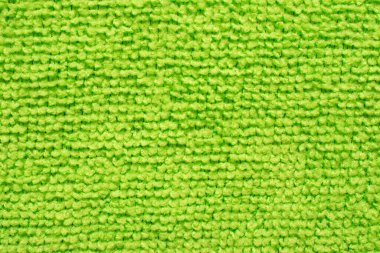 Yeşil mikrofiber kumaş yüzeyi, makro tekstil arkaplanı