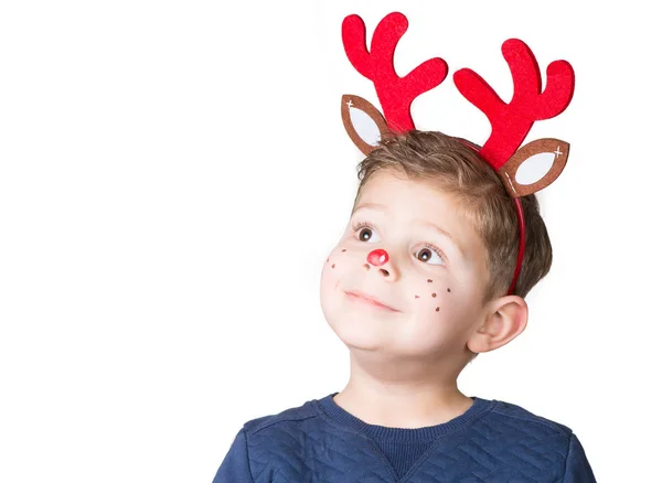 Piękny adorable kid z malowidłami na jego twarz na Boże Narodzenie Zdjęcia Stockowe bez tantiem