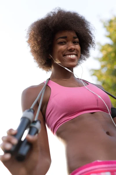 Portrait of woman with jump rope — Stock Photo, Image