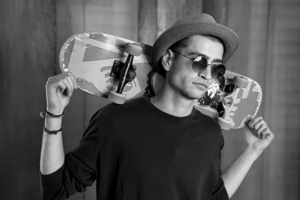 Young man with skateboard — Stock Photo, Image