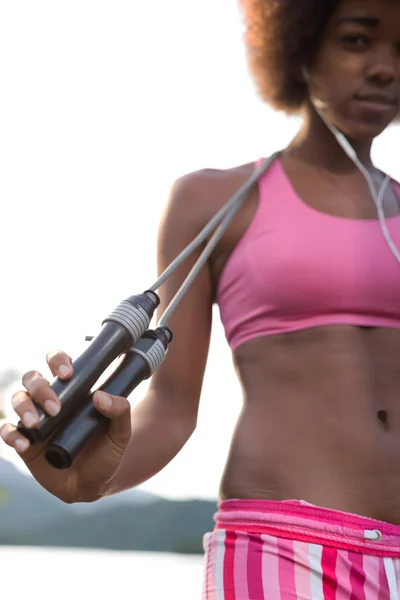 Woman with jump rope — Stock Photo, Image