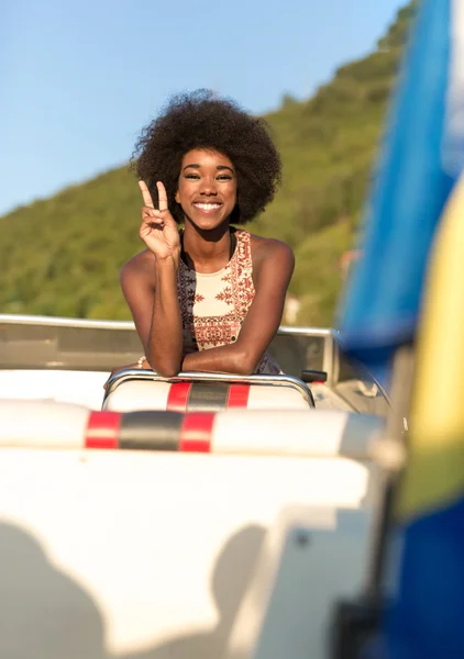 Beautiful girl enjoying boat ride — Stock Photo, Image