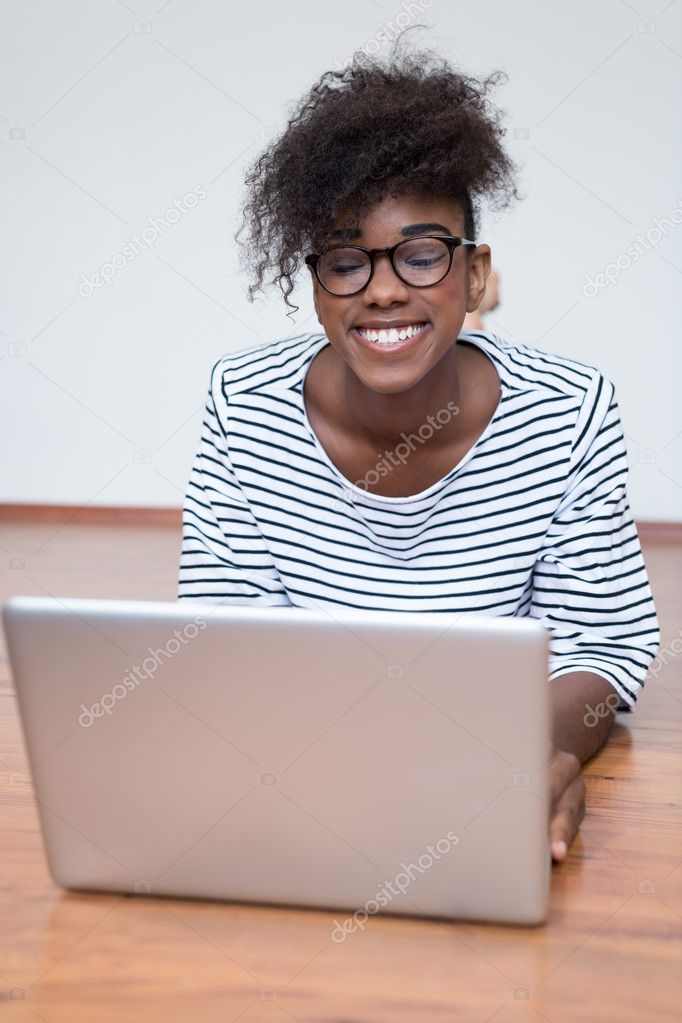 African girl using laptop