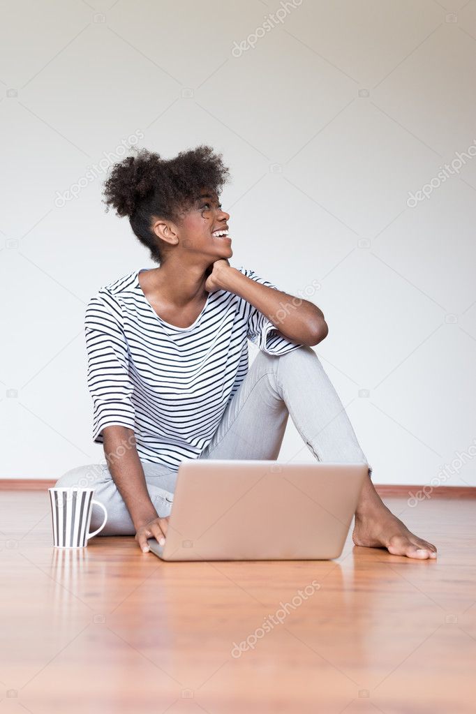 African girl using laptop