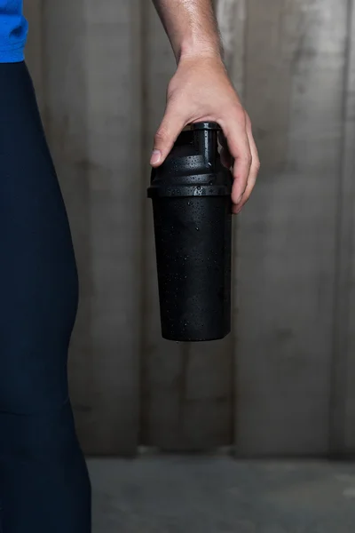 Atleta hombre con deporte botella — Foto de Stock