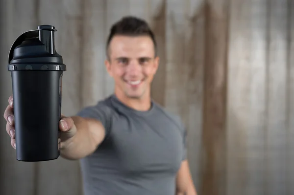 Atleta hombre con deporte botella — Foto de Stock