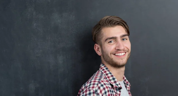 Young man in studio — Stock Photo, Image