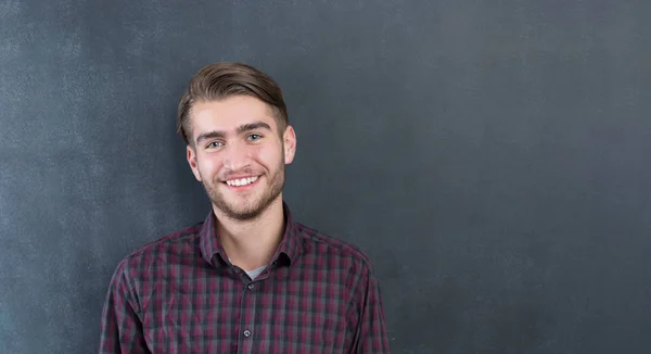 Young man in studio — Stock Photo, Image