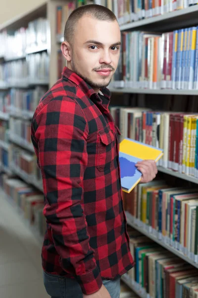 Casual man reading book — Stock Photo, Image
