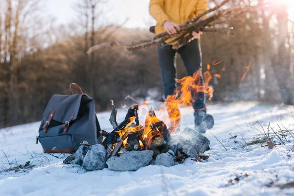 man near Bonfire on winter