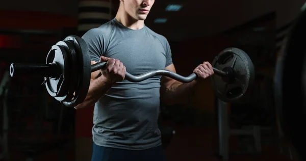 Ejercicio de hombre con barra — Foto de Stock