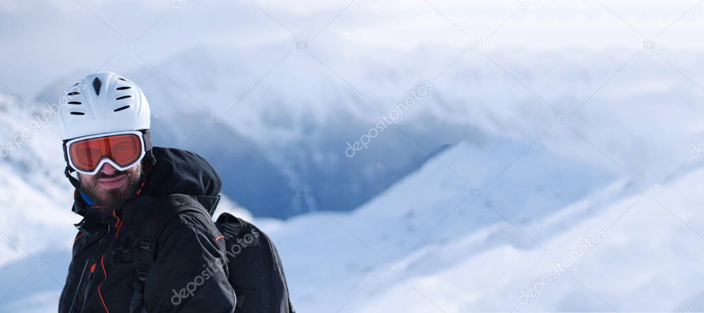 man in snowy mountains