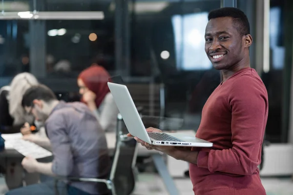 Young man working in office — Stock Photo, Image