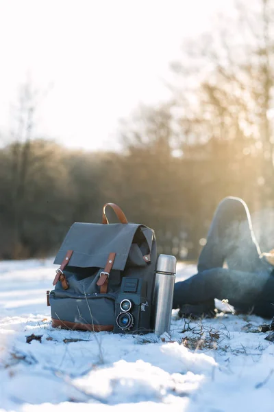 Hiking backpack and camera — Stock Photo, Image