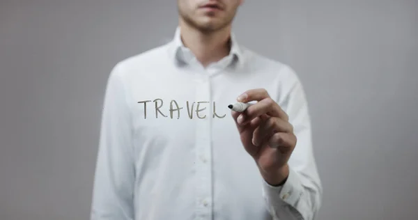 Joven escribiendo sobre vidrio — Foto de Stock