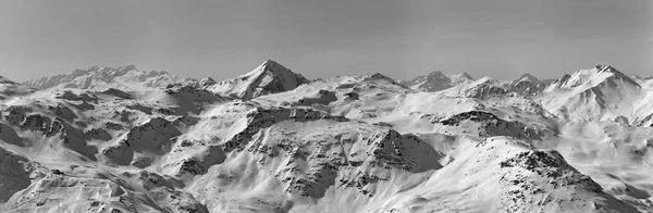 Peaks of French Alps among clouds