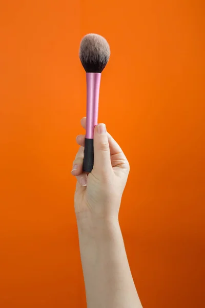 Had Makeup Brush Orange Background — Stock Photo, Image