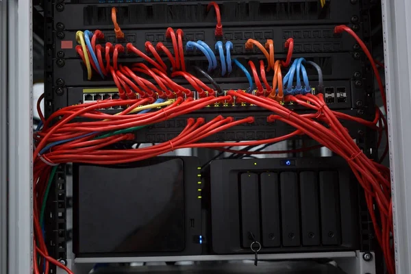 Network server room routers with colorful cables