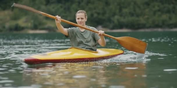 Young Woman Kayaking River — Stock Video