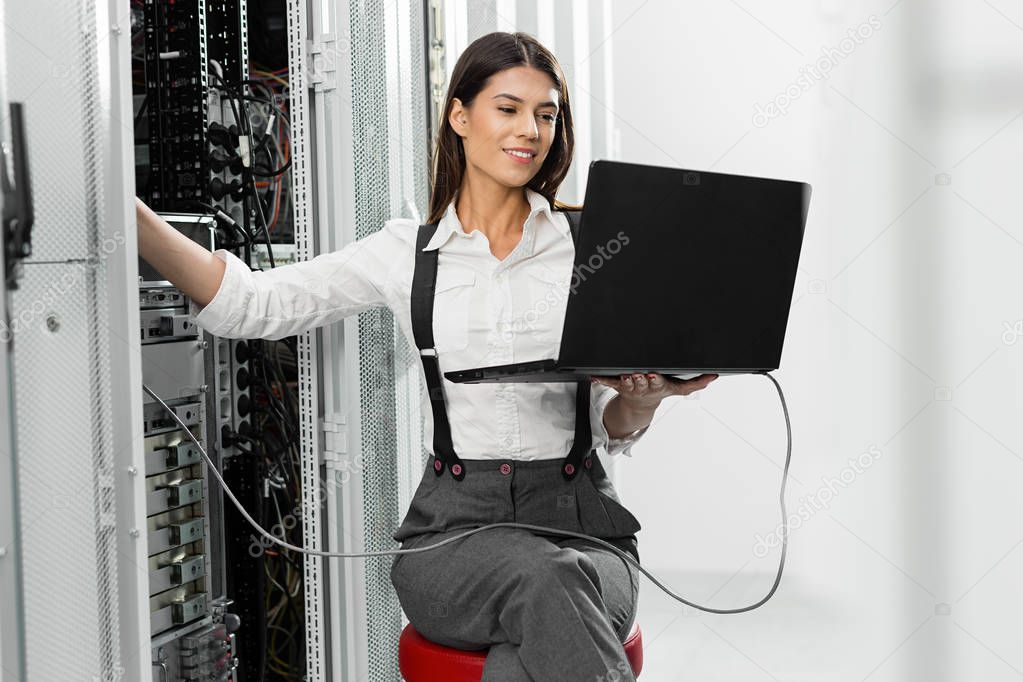 IT expert checking supercomputer server