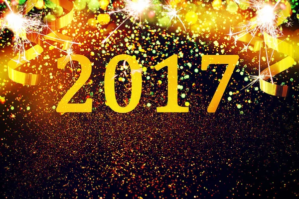 Neujahrsdekoration, Nahaufnahme auf goldenem Hintergrund — Stockfoto
