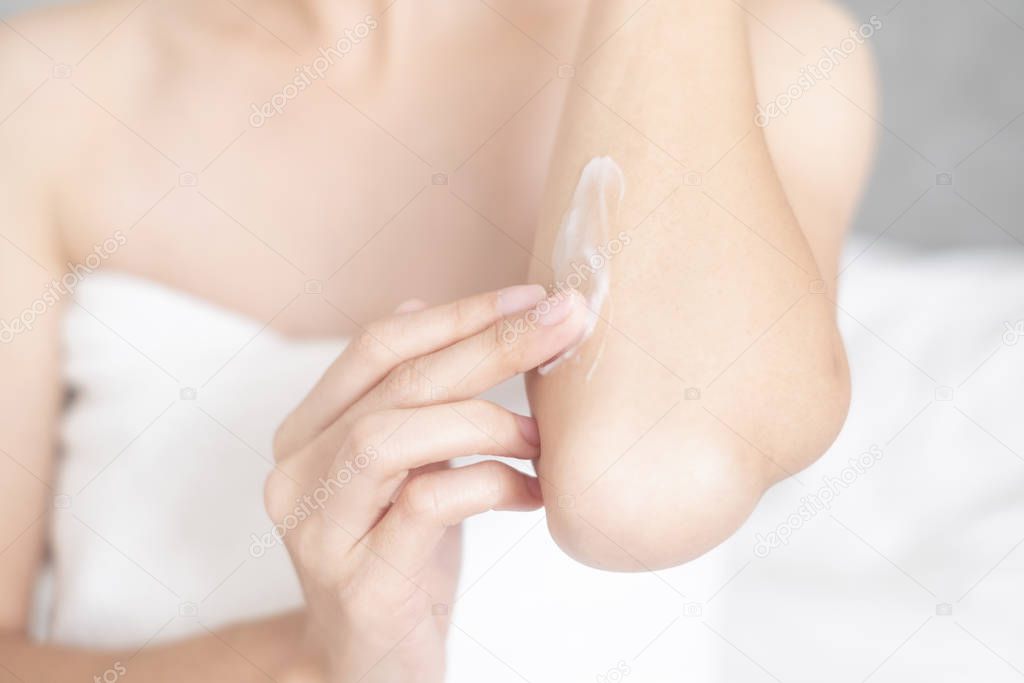 Woman applying arm cream,lotion , Hygiene skin body care concept