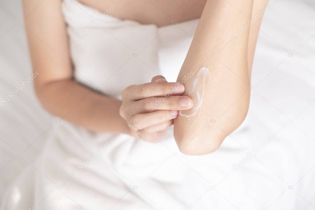 Woman applying arm cream,lotion , Hygiene skin body care concept