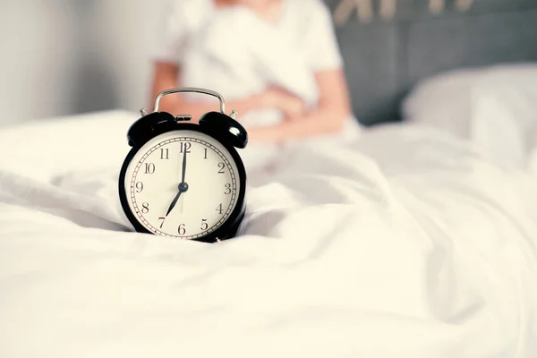 Woman Sleep Bed Turns Alarm Clock Wake Morning Selective Focus — Stock Photo, Image