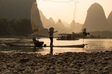 Fishermen on Li River  clipart