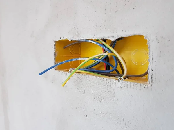 Nova construção de casa mostrando drywall com caixas elétricas — Fotografia de Stock