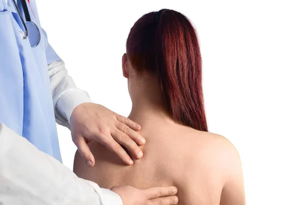 Manos Fisioterapeuta Examinando Espalda Del Paciente Fotos de stock