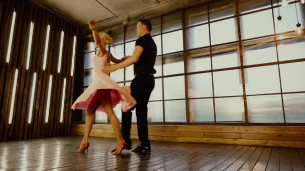 Dirty dancing, a beautiful duet dancing on Valentines Day, against — Stock video