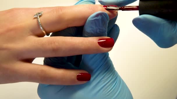 Menina fazendo manicure com macrofotografia no salão de Spa, decoração . — Vídeo de Stock