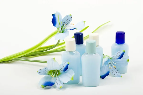 Blue Composition: Cosmetics with Flower — Stock Photo, Image