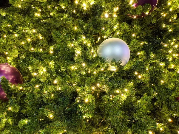 Baubles and Lights on Green Spruce — Stock Photo, Image