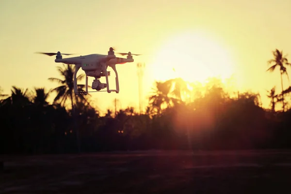 Drone flying in the sunset light beautiful