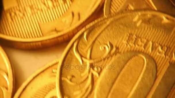 Monedas de oro en movimiento — Vídeos de Stock