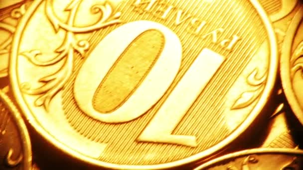Золотые монеты в движении — стоковое видео