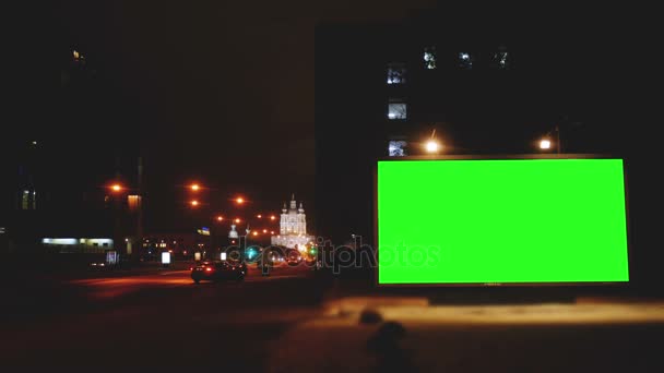 Uma Billboard com uma tela verde em uma rua — Vídeo de Stock