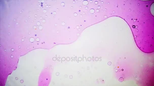 Микроскопический вид чернил в воде — стоковое видео