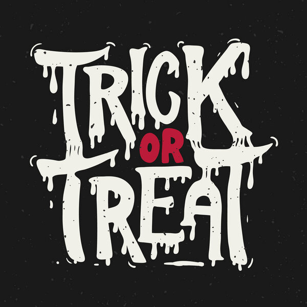 Trick or treat. Halloween theme. Hand drawn lettering phrase on white background. 