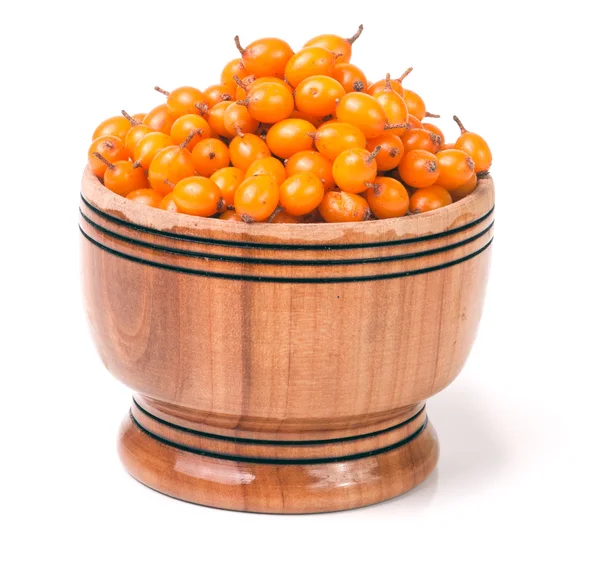 Sea-buckthorn berries in a wooden bowl isolated on white background — Stock Photo, Image