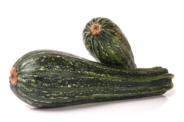 Due zucchine verdi isolate su fondo bianco — Foto Stock