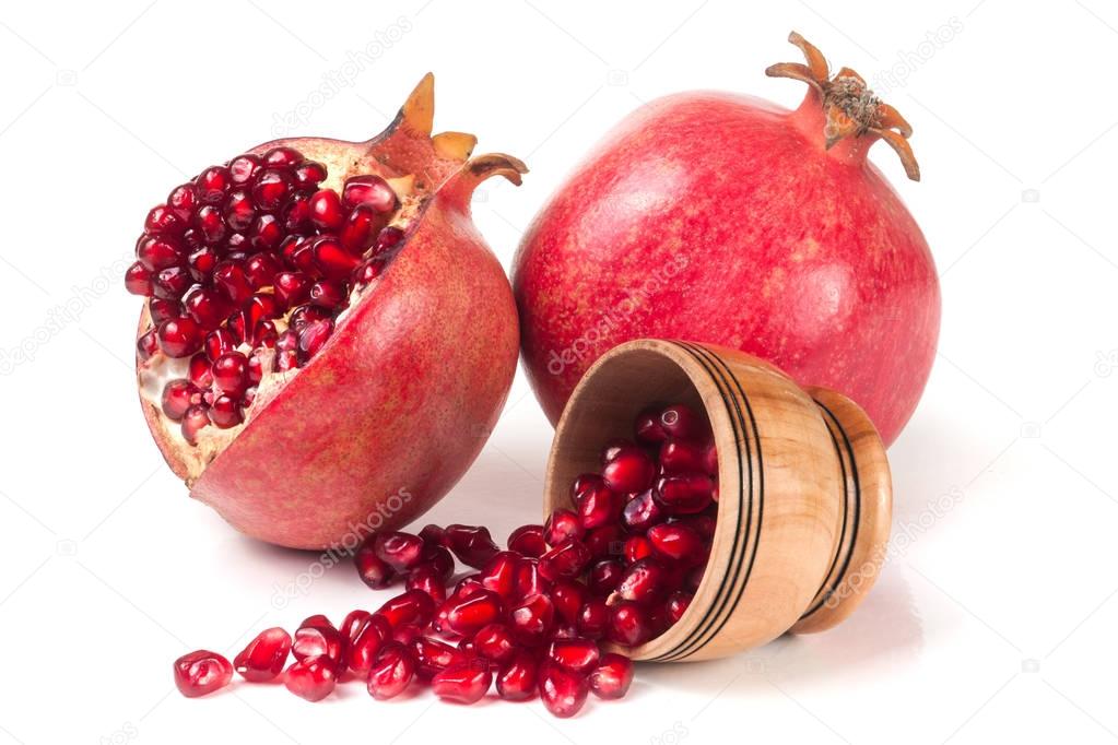 two pomegranate isolated on a white background